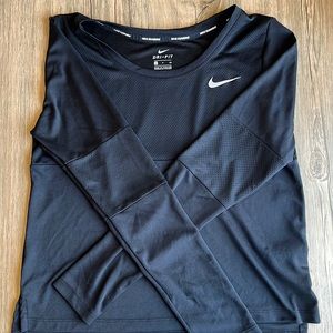 Womens long sleeve Nike Running Dri-Fit shirt.